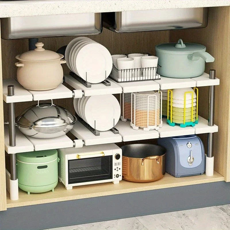 Stainless Steel Kitchen Storage Rack β a durable, rust-resistant stainless steel kitchen storage rack shelf designed for countertops or under-sink organization. Features an expandable, adjustable design with non-slip rubber feet for stability, perfect for maximizing kitchen storage space.