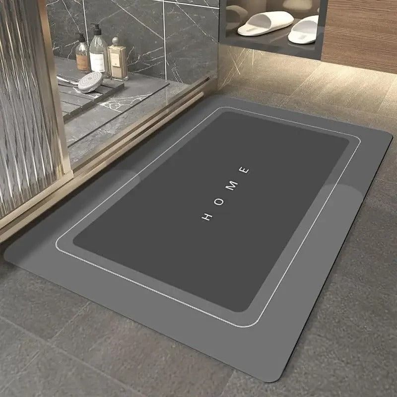 Super Absorbent Floor Mat XT – a soft, super absorbent floor mat for the bathroom with a non-slip backing for safety. Quickly soaks up water to keep floors dry, perfect for bathtubs, showers, and sinks. Durable, machine washable, and ideal for high-moisture areas.