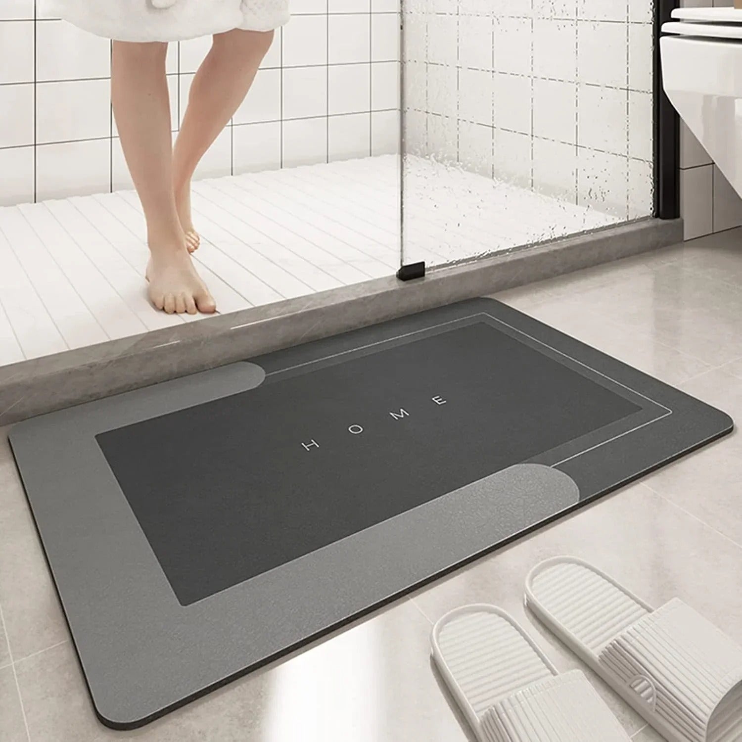  Super Absorbent Floor Mat XT – a soft, super absorbent floor mat for the bathroom with a non-slip backing for safety. Quickly soaks up water to keep floors dry, perfect for bathtubs, showers, and sinks. Durable, machine washable, and ideal for high-moisture areas.