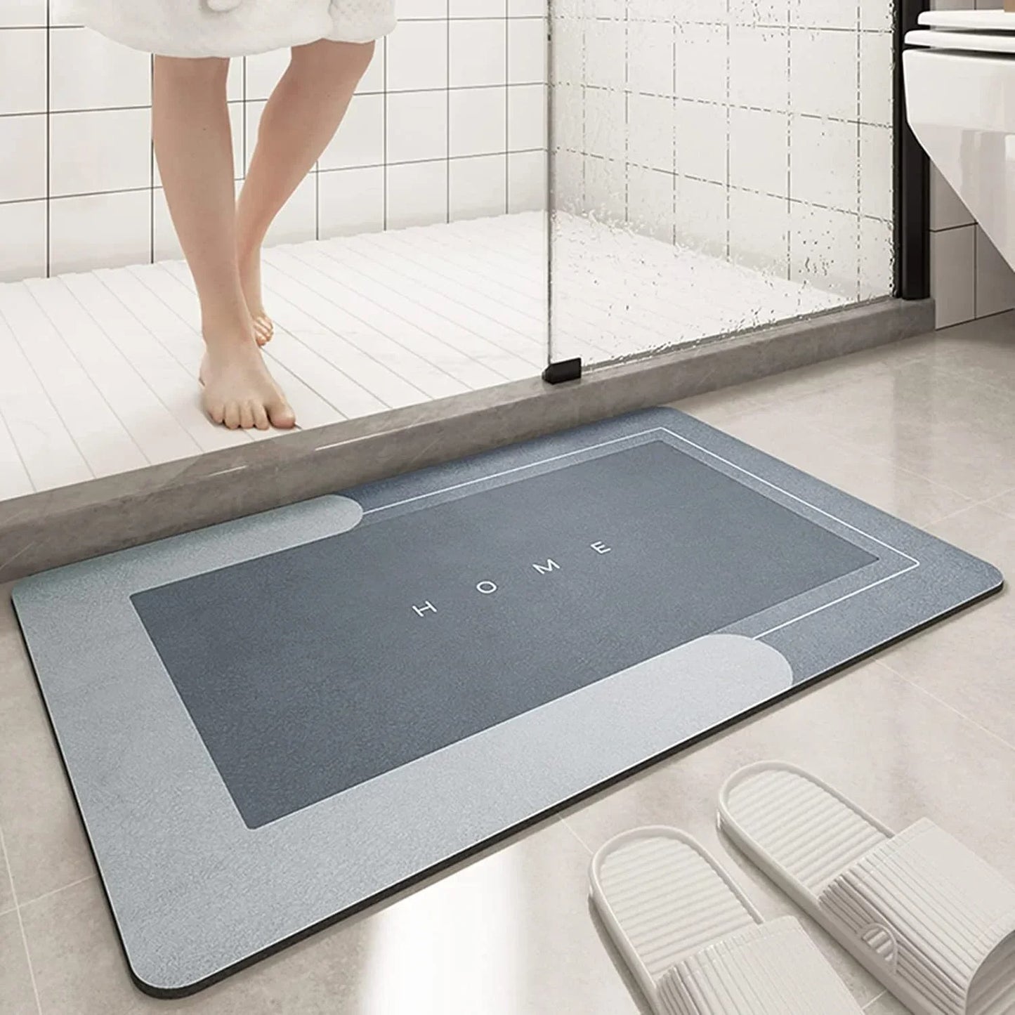  Super Absorbent Floor Mat XT – a soft, super absorbent floor mat for the bathroom with a non-slip backing for safety. Quickly soaks up water to keep floors dry, perfect for bathtubs, showers, and sinks. Durable, machine washable, and ideal for high-moisture areas.