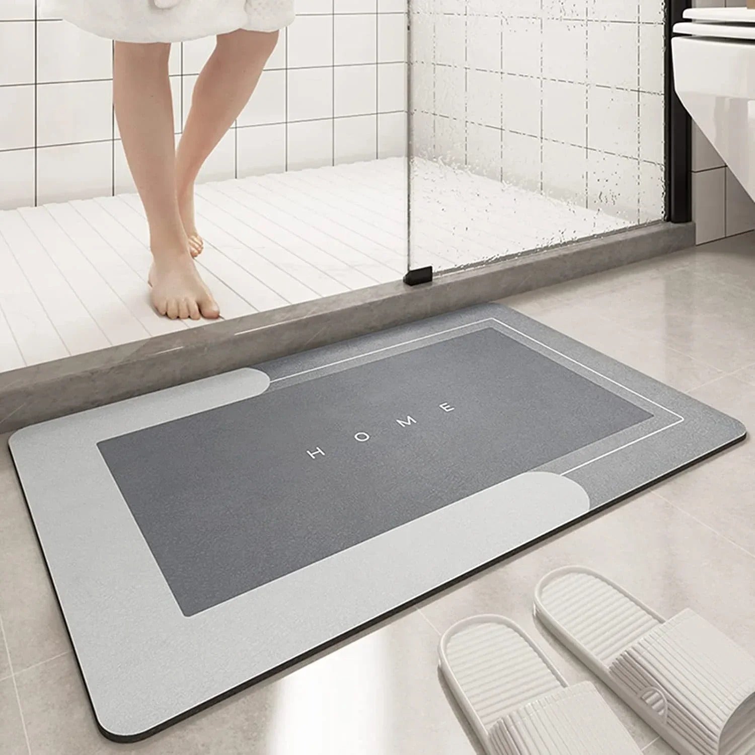  Super Absorbent Floor Mat XT – a soft, super absorbent floor mat for the bathroom with a non-slip backing for safety. Quickly soaks up water to keep floors dry, perfect for bathtubs, showers, and sinks. Durable, machine washable, and ideal for high-moisture areas.